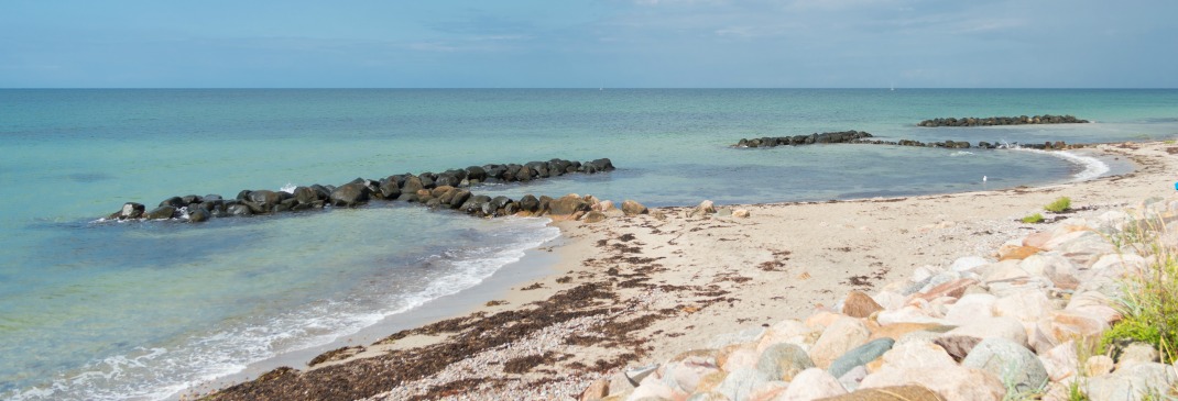 A small sea barrier made of stones on the north side of Sealand