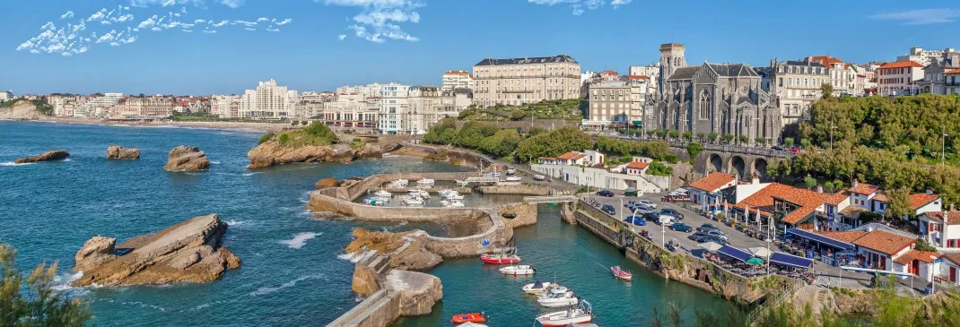 Biarritz coast with boats and and waterfront buildings