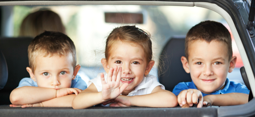 Children in back of hire car