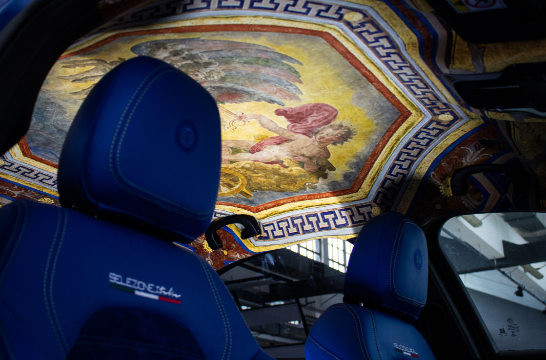 The interior of a one-off Alfa Romeo Giulia, with a headlining that looks like a fresco.